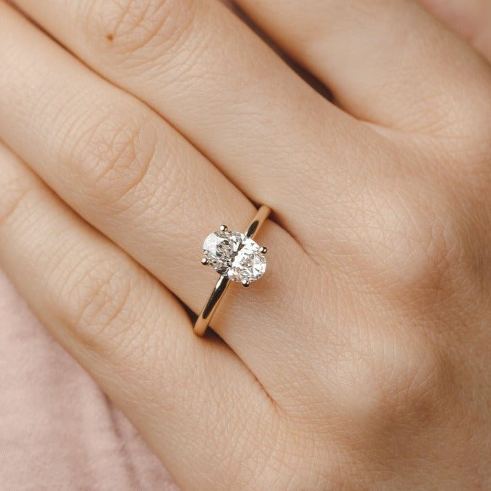 2.0 CT Oval Shaped Moissanite Engagement Ring In Hidden Halo