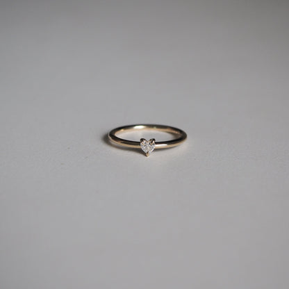 Tiny Solitaire Engagement Ring Featuring 0.15 CT Heart Moissanite