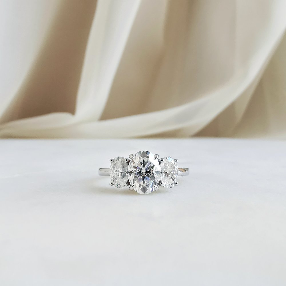 1.50 CT Oval Shaped Moissanite Three Stone Engagement Ring 1